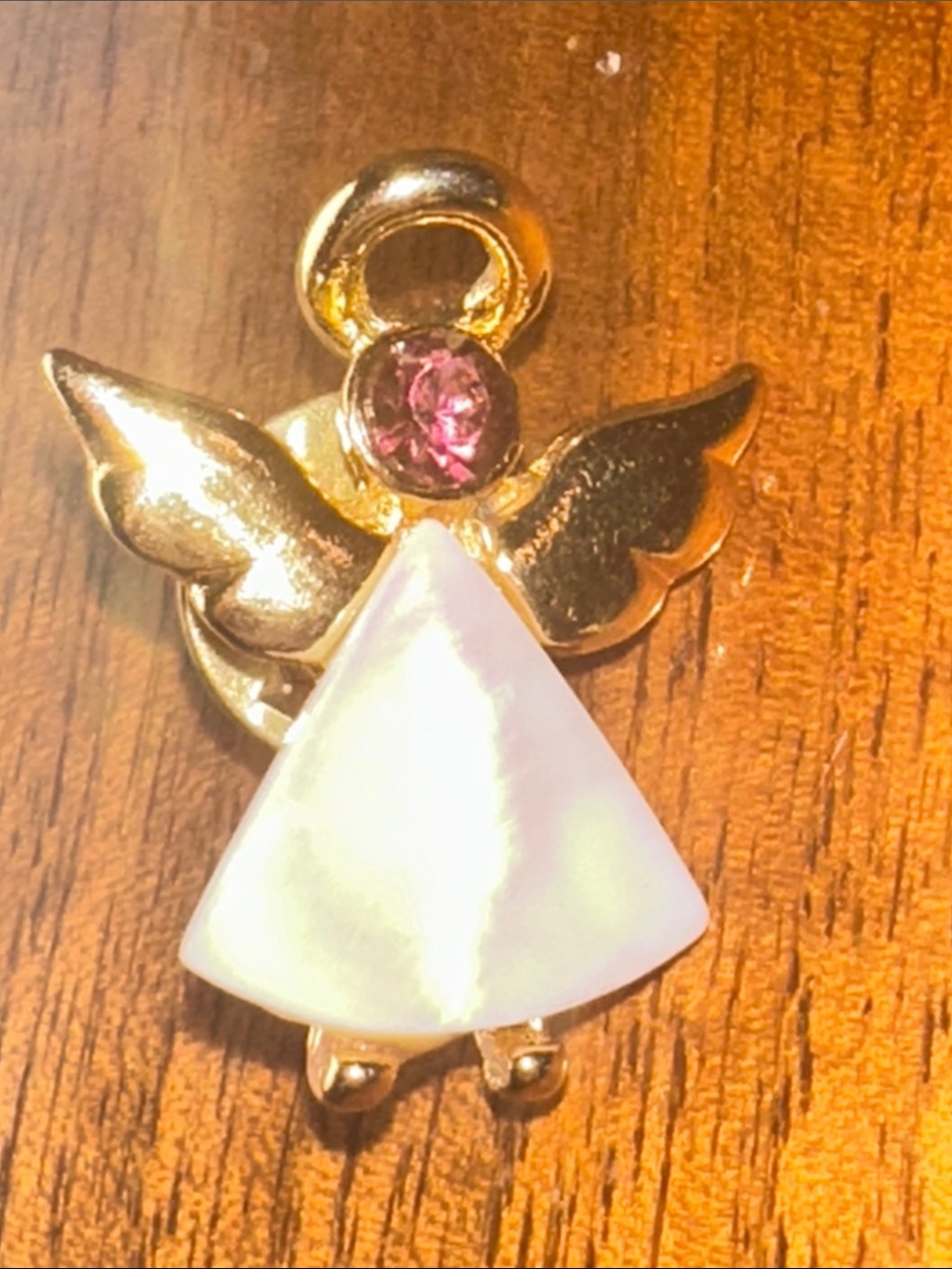 Gold-Tone Angel Pin with White Mother-of-Pearl Accent with purple rhinestone